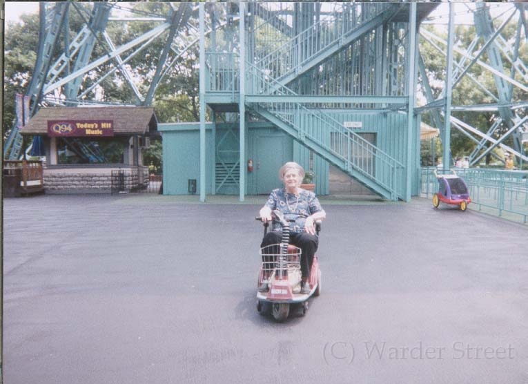 Alice In A Moterized Cart.jpg